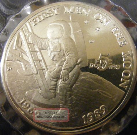 Apollo 11 was the spaceflight that first landed humans on the moon. First Man On The Moon $5 Coin 1969 - 89
