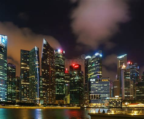 Singapore Skyline On Downtown Core At Marina Bay At Dusk Editorial