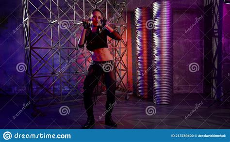 Beautiful And Passionate Female Dancer Is Dancing Modern Dance In Studio Stock Photo Image Of