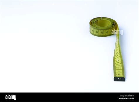A Yellow Tape Measure In Centimeters On A White Background Stock Photo