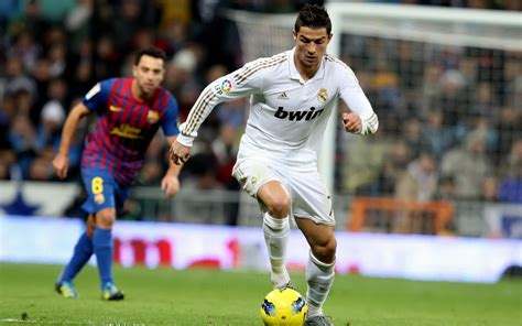 Cristiano Ronaldo Dribbling The Ball In A Match Against Barcelona