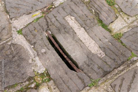 Stormwater Runoff In The Stone Pavement Of A Medieval City Sewers