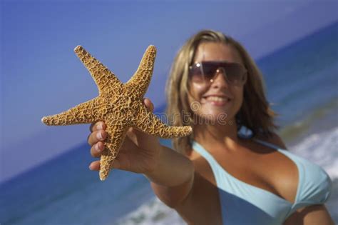 Woman With Starfish Stock Photo Image Of Vacation Starfish