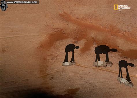 Man tugging a camel in the desert. AT-AT Attack!