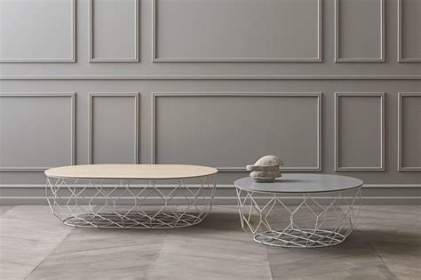 Travertine veneer or walnut veneer over an. COMB Ellipse coffee table