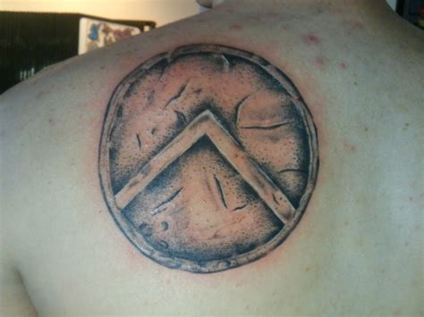 Protection shield tattoo 16 sword tattoo designs and their meanings. Spartan Shield | Tattoos | Pinterest