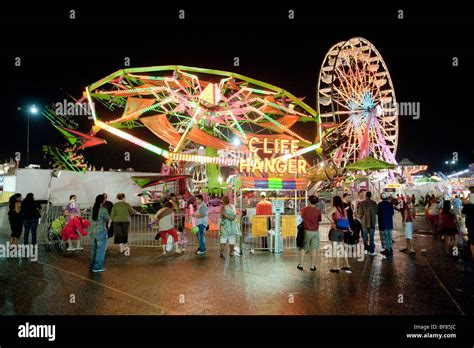 State Fair Carnival Midway At Night Stock Photo Alamy