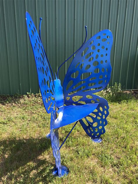 Boasting a butterfly design, it's the open base is crafted from iron. Butterfly Chair Candy Blue - Steel Appeal