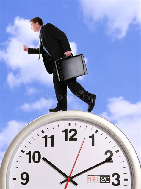 Business Man On Clock Stock Images Image 2436604