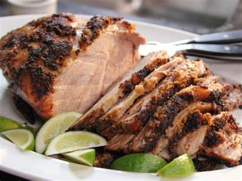 This recipe is perfect for any shindig, slice it thin for a savory appetizer and top it with caramelized onions. Slow-Roasted Spiced Pork Recipe | Ina Garten | Food Network