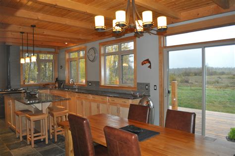 In the end, a timber frame home is a masterpiece of craftsmanship, style, and personal taste. Designer #kitchen + #diningroom is featured in a Custom ...