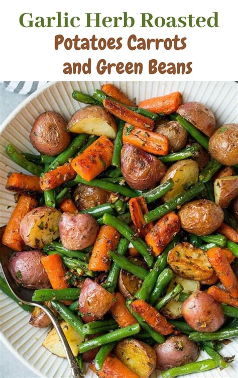 Add to baking sheet and toss with potatoes and carrots. Garlic Herb Roasted Potatoes Carrots and Green Beans ...