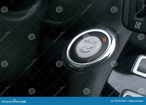 Car Dashboard With Focus On Green Engine Start Stop Button Modern Car