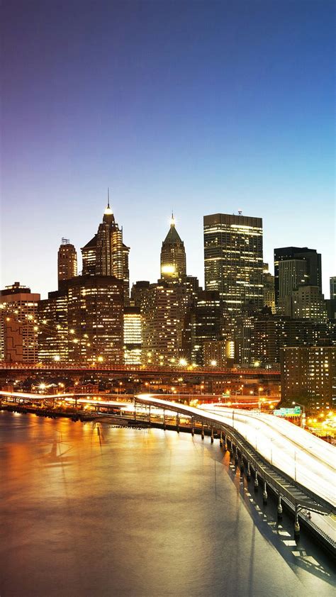 New York City Skyline At Dusk Wallpaper Backiee