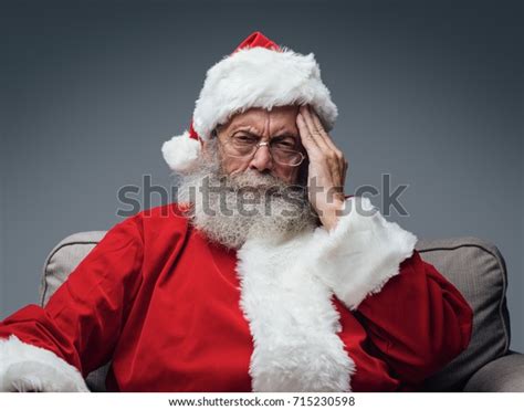 Sad Santa Claus Having Headache On Stock Photo Edit Now 715230598