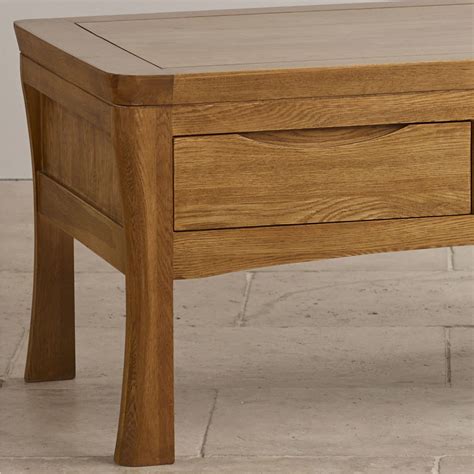 Orrick 4 Drawer Coffee Table In Rustic Oak Oak Furniture Land