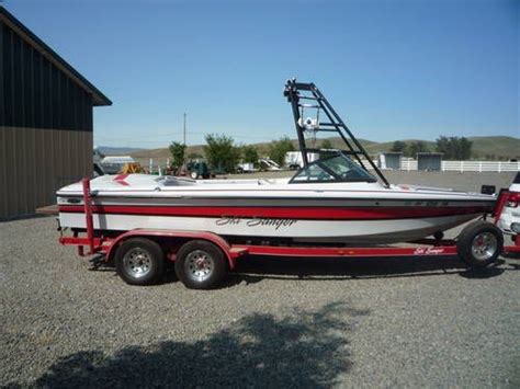 Boat cover with wakeboard tower. My boat (Sanger V210). Selling it so please contact me if ...