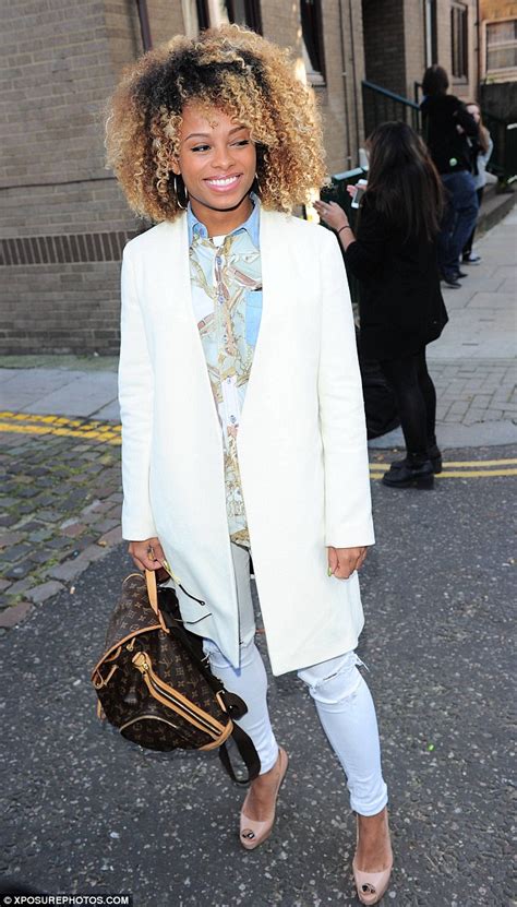 'work hard in silence, let success be your noise.' get my new single 'figured out' X Factor's Fleur East shows her flair in chic blazer and ...