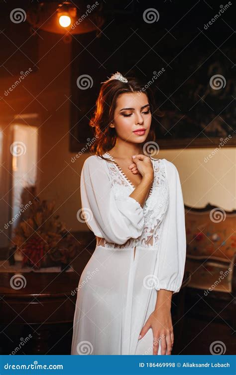 Boudoir Photo Of Girl Wearing Stylish Black Lingerie Underwear Sitting On The Window Stock