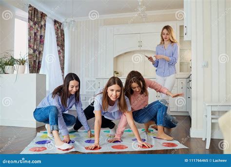 A Group Of Friends Play In Games On The Floor Indoors Stock Image Image Of Floor Indoors