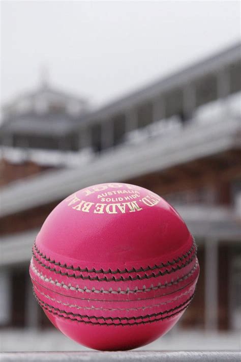 A bit like a baseball (in size and hardness), but the leather covering is thicker and joined in two hemispheres, not in a tennis ball pattern. Pakistan to use pink ball in Quaid-e-Azam trophy final