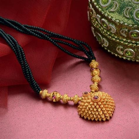 It is a symbol of prosperity, love and happiness. jewellery | gold | ganthan #WamanHariPetheGoldJewellery ...