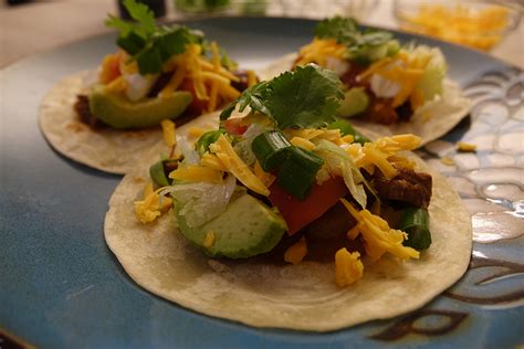 Place the beef, bell peppers and onions in an electric pressure cooker. Super Easy Instant Pot Slow Cooked Flank Steak Tacos | Best Buy Blog
