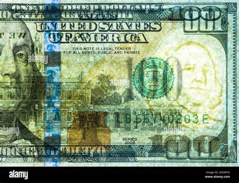 A United States Of America 100 Dollar Bill Has Been Backlit In Order