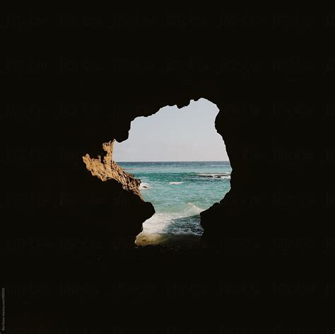 View Of Ocean Through Cave Del Colaborador De Stocksy Ben Sasso