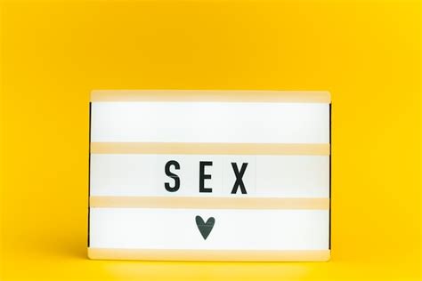 Premium Photo Light Box With Text Sex On Yellow Wall