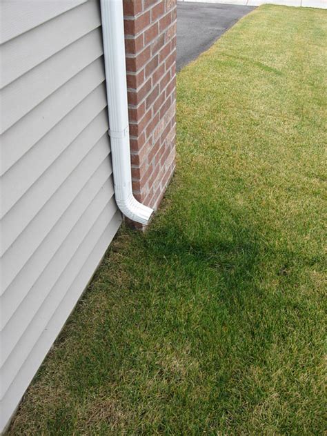 What Is The Purpose Of A Downspout Bell Seamless Gutters