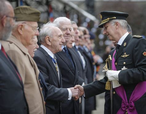 Belgian King Philippe Greets Veterans At The End Of A Military Ceremony