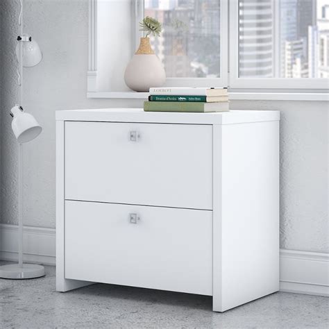 Lateral file cabinets are preferred due to efficient dimensions, clever space management, and greater convenience accessing routine files. White 2 Drawer Lateral File Cabinet - Echo | RC Willey ...