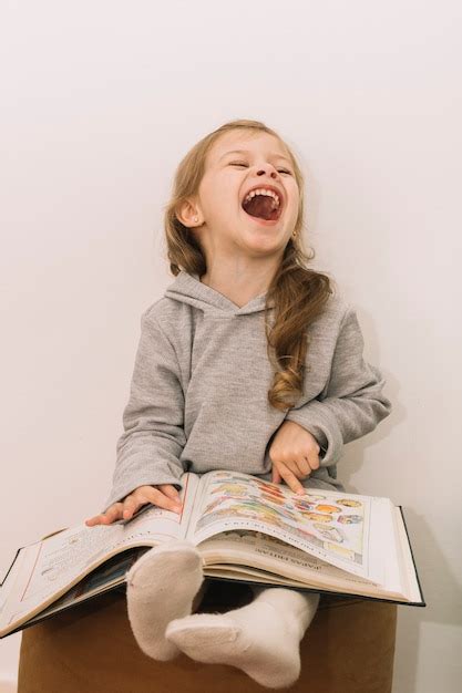 Woman Laughing As She Reads A Text Message Hoodoo Wallpaper