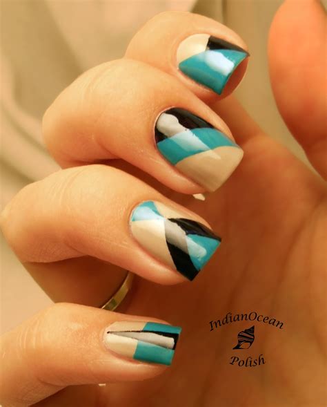 Using empower nail art for masking and custom striping tape. Indian Ocean Polish: Colour Blocking Nails with OPI Fly