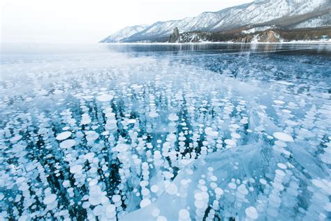 Worlds Oldest Lake Transforms Into Picturesque Winter Wonderland