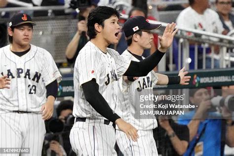 Shohei Ohtani Of Team Japan Greets Teammates At The Dugout At The End