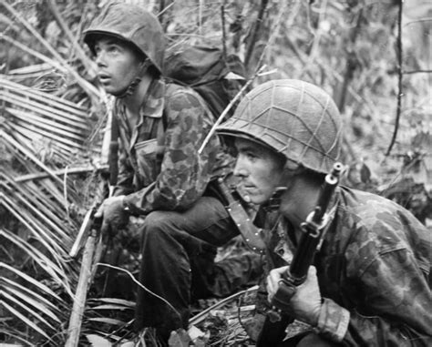 world war ii bougainville ntwo u s marines on patrol at cape torokina bougainville island new