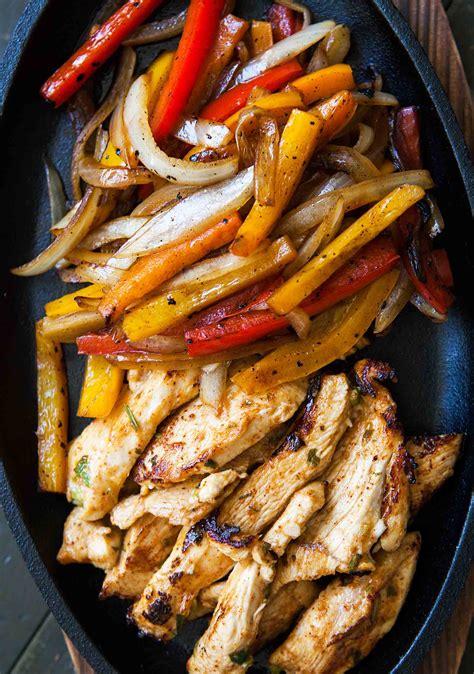 You can increase the quality of your dining table by adding make sure to serve the grilled chicken with side veggies, or raita along with ring onions and you can also add lemons with that to make it spicier. Chicken Fajitas Recipe {Homemade Marinade} | SimplyRecipes.com