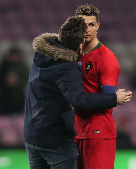 Cristiano Ronaldo Approached By Pitch Invaders As Fan Attempts To Kiss Portugal Star During
