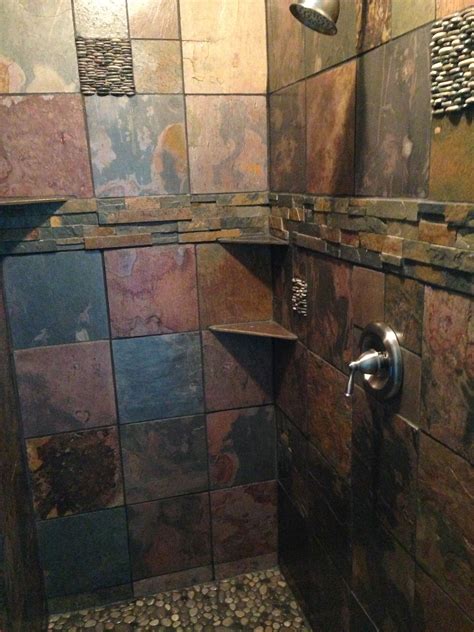 Although real slate tile is a durable flooring material, it is possible for individual tiles to become chipped, cracked, or otherwise damaged beyond repair. Finished slate tile and beach stone shower!!I like how ...