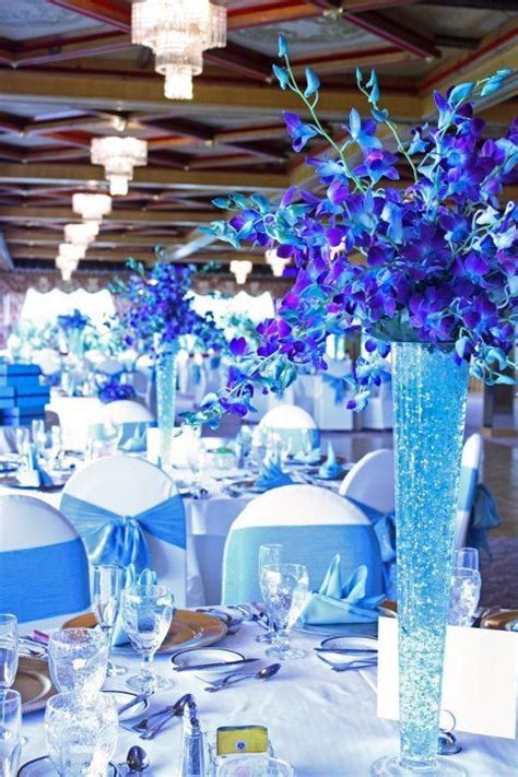 Gorgeous purple and white tall wedding centerpiece ~ we ❤ this! 50 Insanely Over-the-top Quinceanera Centerpieces ...