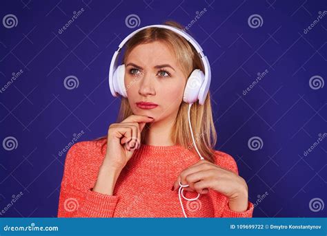 Thoughtful Blond In Headphones Stock Photo Image Of Beauty Lady