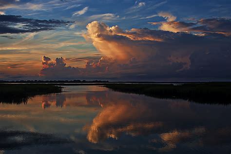 Storm clouds at Sunrise Photograph by Terry Shoemaker