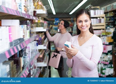 Adult Women Picking Cream From Shelf Stock Image Image Of Comparison Customer 72500457