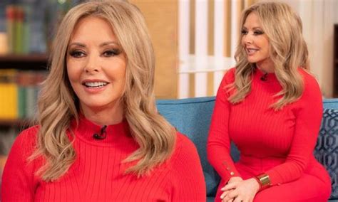 Carol Vorderman Flaunts Her Eye Popping Curves In A Skintight Red