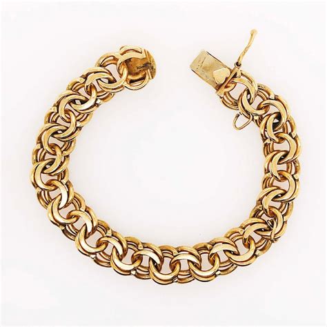 Heavy Gold Charm Bracelet 14 Karat Large Gold Chain Bracelet For Sale
