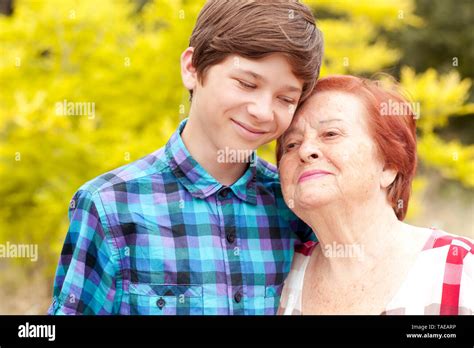 Happy Granny With Grandson Resting Outdoors Togetherness Stock Photo