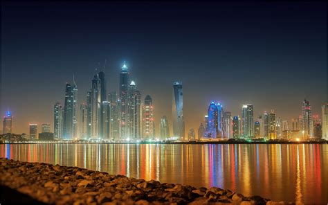 Dubai Skyline Reflection At Night Hd Wallpapers High Resolution