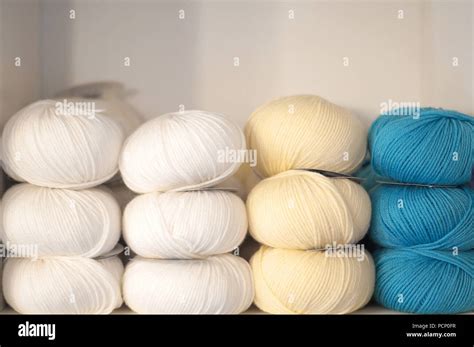 A Stack Balls Of Wool In Different Colours Stock Photo Alamy